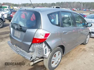 2010 Honda Fit with VIN JHMGE8H25AS026697, listed as a IAAI auction lot 41775689 with 92,805 mi miles. Bid and sale history available at carsss.com. Image 4.