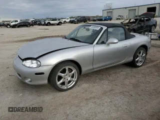 2001 Mazda MX-5 Miata with VIN JM1NB353510214097, listed as a Copart auction lot 50306595 with 111,359 mi miles and Salvage Title. Bid and sale history available at DreamBid. Image 1.