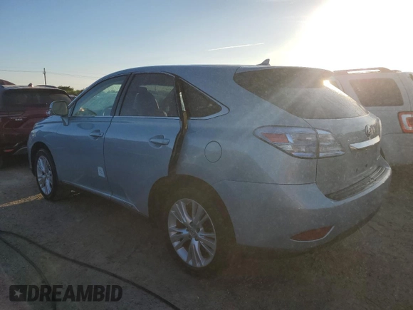 2012 Lexus RX 450h with VIN JTJZB1BA9C2006141, listed as a Copart auction lot 74452404 with Not provided miles and Salvage title. Bid and sale history available at DreamBid. Image 2.
