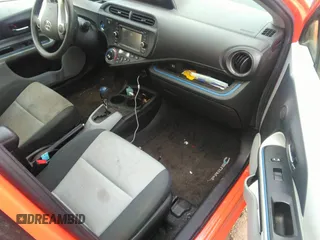 2013 Toyota Prius One z VIN JTDKDTB34D1033086, wystawiony jako IAAI lot #40364357 z przebiegiem 96 948 mil mil oraz . Historia ofert i sprzedaży dostępna na DreamBid. Obrazek 5.