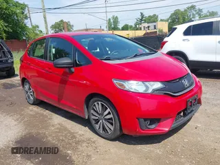 2015 Honda Fit EX-L z VIN 3HGGK5H86FM701620, wystawiony jako IAAI lot #42597150 z przebiegiem 185 685 mil mil oraz . Historia ofert i sprzedaży dostępna na DreamBid. Obrazek 1.