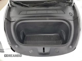 2022 Tesla Model Y Performance with VIN 7SAYGDEF1NF410241, listed as a Copart auction lot 55359505 with 42,652 mi miles and Salvage Title. Bid and sale history available at DreamBid. Image 12.