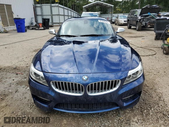 2015 BMW Z4 sDrive35is with VIN WBALM1C59FE634589, listed as a Copart auction lot 67096594 with Not provided miles and Salvage title. Bid and sale history available at DreamBid. Image 5.