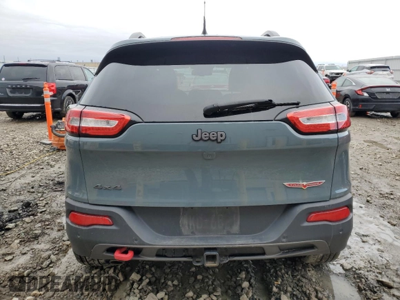 2014 Jeep Cherokee Trailhawk with VIN 1C4PJMBB9EW251749, listed as a Copart auction lot 49712915 with 94,289 mi miles and Clean Title. Bid and sale history available at carsss.com. Image 6.