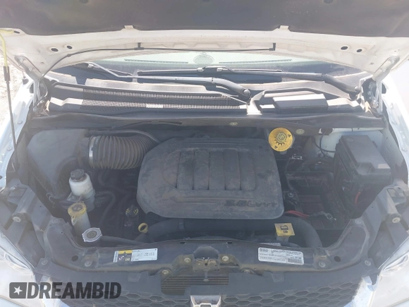 2020 Dodge Grand Caravan SE with VIN 2C4RDGBG1LR198242, listed as a IAAI auction lot 41759580 with 197,144 mi miles and . Bid and sale history available at DreamBid. Image 10.