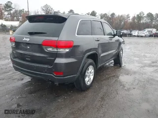 2016 Jeep Grand Cherokee Laredo with VIN 1C4RJFAG0GC325114, listed as a IAAI auction lot 40878955 with 277,225 mi miles. Bid and sale history available at carsss.com. Image 4.