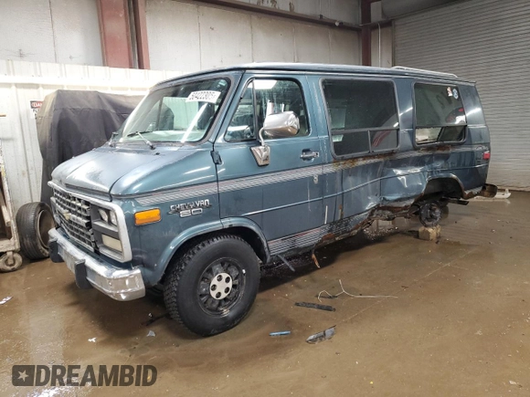 1995 Chevrolet Chevy Van z VIN 1GBEG25K2SF243949, wystawiony jako Copart lot #50422305 z przebiegiem 193 169 mil mil oraz Szkody całkowita. Historia ofert i sprzedaży dostępna na DreamBid. Obrazek 1.