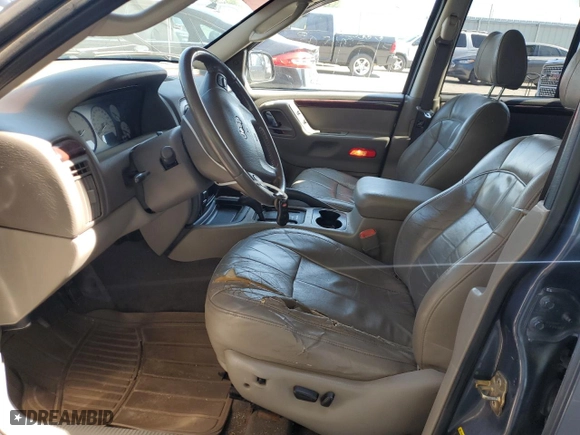 2003 Jeep Grand Cherokee Limited with VIN 1J8GW58N73C605929, listed as a Copart auction lot 70755024 with 173,147 mi miles and Salvage Title. Bid and sale history available at carsss.com. Image 7.