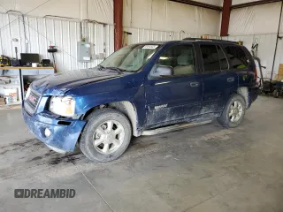 2005 GMC Envoy SLE with VIN 1GKDT13S252205556, listed as a Copart auction lot 74238784 with 198,982 mi miles and Clean Title. Bid and sale history available at carsss.com. Image 1.