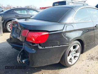 2013 BMW 3 Series 335i with VIN WBADX7C52DJ590132, listed as a IAAI auction lot 41486602 with 154,984 mi miles and . Bid and sale history available at DreamBid. Image 18.