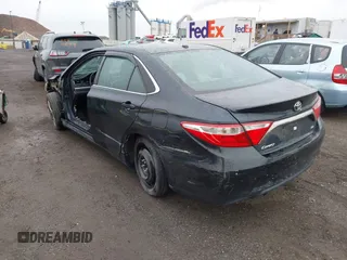 2015 Toyota Camry XLE with VIN 4T1BF1FK1FU087653, listed as a IAAI auction lot 41942940 with 180,274 mi miles. Bid and sale history available at carsss.com. Image 3.