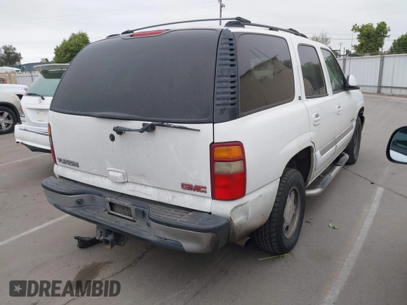 2002 GMC Yukon SLT with VIN 1GKEC13T02R313772, listed as a IAAI auction lot 42131289 with 215,164 mi miles. Bid and sale history available at carsss.com. Image 4.