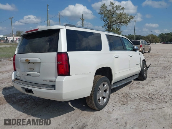 2017 Chevrolet Suburban Premier with VIN 1GNSKJKC0HR288648, listed as a IAAI auction lot 41579677 with Not Provided miles and . Bid and sale history available at DreamBid. Image 4.