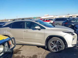 2017 Lexus RX with VIN 2T2BGMCA2HC013703, listed as a IAAI auction lot 41200592 with 134,403 mi miles. Bid and sale history available at carsss.com. Image 14.