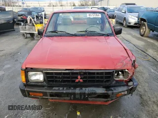 1991 Mitsubishi Mighty Max z VIN JA7FL24W3MP017705, wystawiony jako Copart lot #85737304 z przebiegiem 261 896 mil mil oraz Szkody całkowita. Historia ofert i sprzedaży dostępna na DreamBid. Obrazek 5.