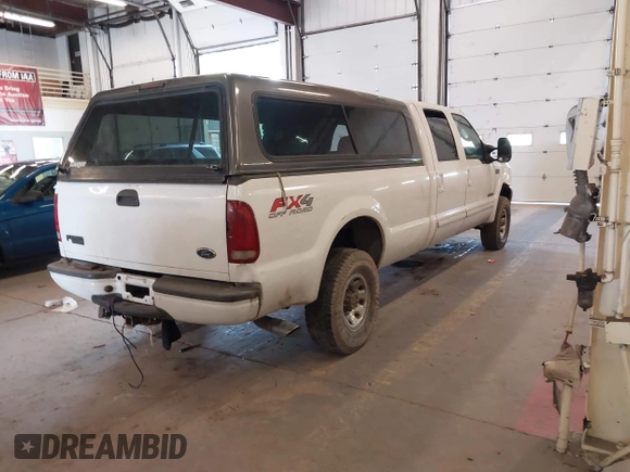 2003 Ford Super Duty F-250 XL with VIN 1FTNW21F43EA04885, listed as a IAAI auction lot 42073892 with 1 mi miles. Bid and sale history available at carsss.com. Image 4.