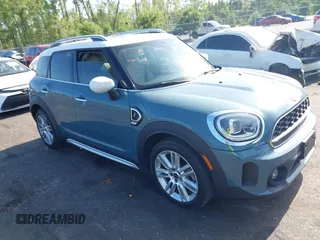 2022 MINI Countryman Cooper S z VIN WMZ53BR02N3N67991, wystawiony jako IAAI lot #42181491 z przebiegiem 54 701 mil mil oraz . Historia ofert i sprzedaży dostępna na DreamBid. Obrazek 1.