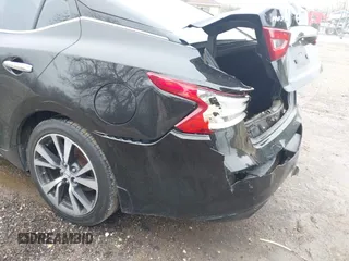 2017 Nissan Maxima SR with VIN 1N4AA6AP8HC390071, listed as a IAAI auction lot 42169689 with 120,608 mi miles and . Bid and sale history available at DreamBid. Image 18.
