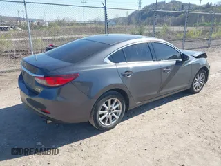 2016 Mazda 6 i Sport with VIN JM1GJ1U54G1413244, listed as a IAAI auction lot 42062416 with 148,970 mi miles and . Bid and sale history available at DreamBid. Image 4.