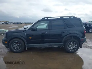 2021 Ford Bronco Sport Badlands z VIN 3FMCR9D96MRA42819, wystawiony jako IAAI lot #41000673 z przebiegiem 58 831 mil mil oraz . Historia ofert i sprzedaży dostępna na DreamBid. Obrazek 13.
