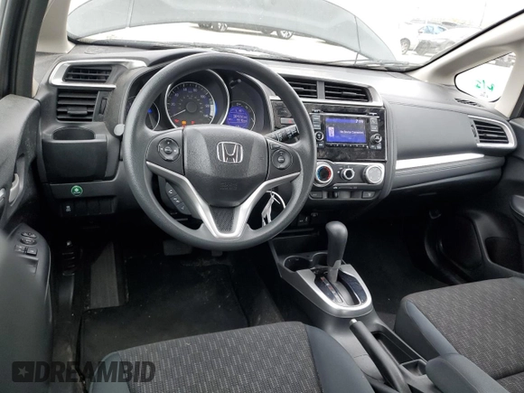 2015 Honda Fit LX z VIN 3HGGK5H58FM785137, wystawiony jako Copart lot #59013315 z przebiegiem 84 592 mil mil oraz Szkoda całkowita • Salvage title. Historia ofert i sprzedaży dostępna na DreamBid. Obrazek 8.