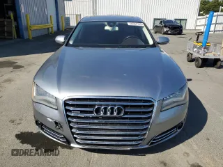 2012 Audi A8 z VIN WAURVAFD7CN023286, wystawiony jako Copart lot #56594745 z przebiegiem 199 443 mil mil oraz Czysty tytuł • Clean title. Historia ofert i sprzedaży dostępna na DreamBid. Obrazek 5.