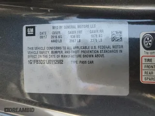 2018 Chevrolet Camaro 1LT with VIN 1G1FB3DS1J0112902, listed as a Copart auction lot 62571584 with 99,300 mi miles and Salvage Title. Bid and sale history available at carsss.com. Image 14.