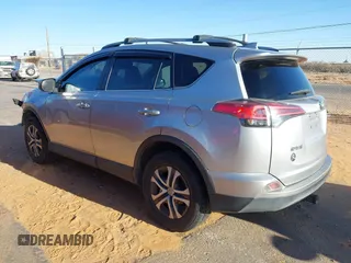 2017 Toyota RAV4 LE with VIN 2T3BFREV2HW672794, listed as a IAAI auction lot 41814820 with 115,721 mi miles and . Bid and sale history available at DreamBid. Image 3.