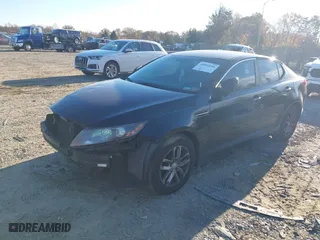 2013 Kia Optima LX with VIN 5XXGM4A71DG185525, listed as a IAAI auction lot 40803086 with 171,741 mi miles. Bid and sale history available at carsss.com. Image 2.