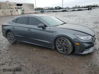 2023 Hyundai Sonata N Line with VIN KMHL14JC7PA261474, listed as a Copart auction lot 86417684 with 57,657 mi miles and Salvage Title. Bid and sale history available at carsss.com. Image 4.