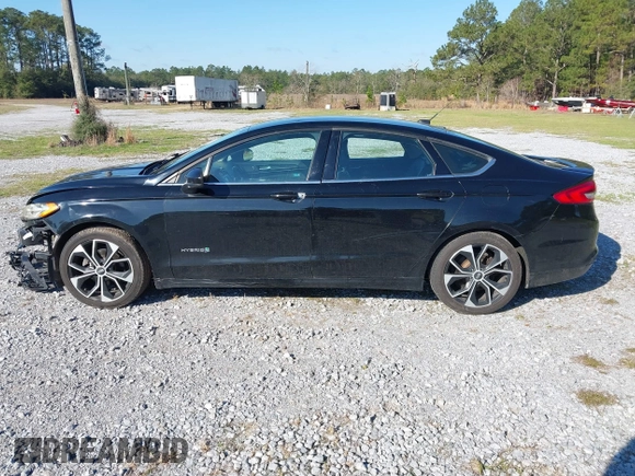 2018 Ford Fusion SE with VIN 3FA6P0LU7JR138906, listed as a IAAI auction lot 41573985 with 127,660 mi miles and . Bid and sale history available at DreamBid. Image 14.