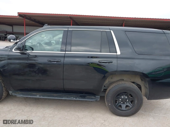 2019 Chevrolet Tahoe Commercial with VIN 1GNLCDECXKR231072, listed as a IAAI auction lot 41800007 with 100,101 mi miles. Bid and sale history available at carsss.com. Image 14.