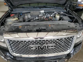 2016 GMC Sierra 2500HD Denali z VIN 1GT12UE84GF275611, wystawiony jako Copart lot #52740225 z przebiegiem 135 747 mil mil oraz Szkoda całkowita • Salvage title. Historia ofert i sprzedaży dostępna na DreamBid. Obrazek 11.