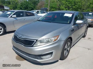 2013 Kia Optima Hybrid EX with VIN KNAGM4AD8D5059623, listed as a IAAI auction lot 42052998 with 135,051 mi miles. Bid and sale history available at carsss.com. Image 2.