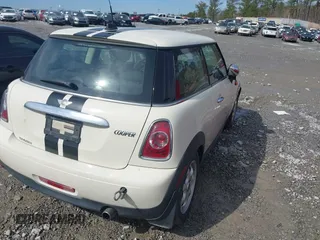2012 MINI Hardtop with VIN WMWSU3C53CT185697, listed as a IAAI auction lot 41761981 with 201,335 mi miles and . Bid and sale history available at DreamBid. Image 4.