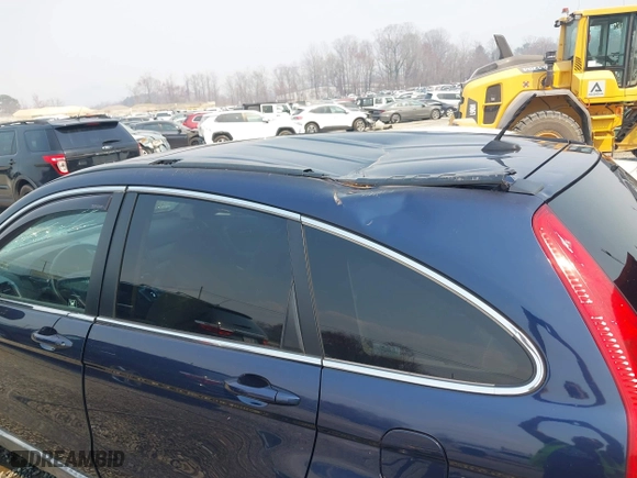 2009 Honda CR-V EX-L with VIN 5J6RE48759L010532, listed as a IAAI auction lot 41843362 with 112,651 mi miles. Bid and sale history available at carsss.com. Image 19.