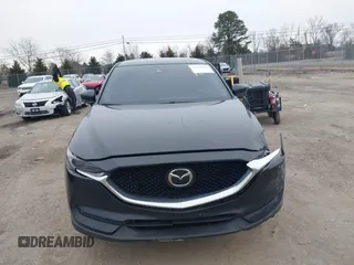 2017 Mazda CX-5 Grand Touring with VIN JM3KFBDL6H0179557, listed as a IAAI auction lot 41546493 with 103,585 mi miles. Bid and sale history available at carsss.com. Image 12.