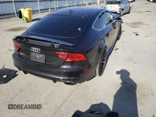 2015 Audi RS 7 Prestige z VIN WUAW2AFC6FN900136, wystawiony jako Copart lot #54558253 z przebiegiem 69 045 mil mil oraz . Historia ofert i sprzedaży dostępna na DreamBid. Obrazek 3.