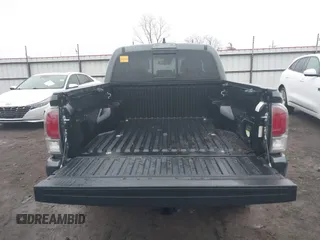 2022 Toyota Tacoma SR with VIN 3TMCZ5AN4NM476170, listed as a IAAI auction lot 41482149 with 57,126 mi miles and . Bid and sale history available at DreamBid. Image 16.