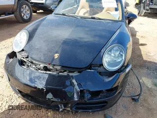 2007 Porsche 911 Carrera S z VIN WP0CB29967S775552, wystawiony jako IAAI lot #42218602 z przebiegiem 81 015 mil mil oraz . Historia ofert i sprzedaży dostępna na DreamBid. Obrazek 6.