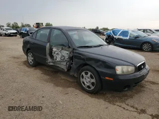 2003 Hyundai Elantra GLS z VIN KMHDN45D63U594320, wystawiony jako Copart lot #58742565 z przebiegiem 163 772 mil mil oraz Szkoda całkowita • Salvage title. Historia ofert i sprzedaży dostępna na DreamBid. Obrazek 4.