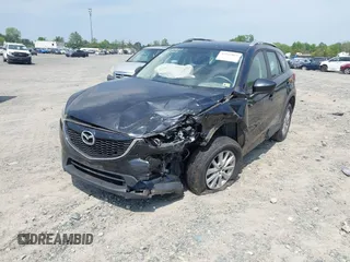 2014 Mazda CX-5 Sport with VIN JM3KE2BE3E0405976, listed as a IAAI auction lot 42161069 with 66,301 mi miles and . Bid and sale history available at carsss.com. Image 17.
