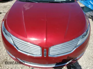 2013 Lincoln MKZ z VIN 3LN6L2G95DR804619, wystawiony jako Copart lot #57101315 z przebiegiem Nie podano mil oraz Szkoda całkowita • Salvage title. Historia ofert i sprzedaży dostępna na DreamBid. Obrazek 11.