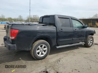 2012 Nissan Titan SV with VIN 1N6AA0EJ2CN311162, listed as a Copart auction lot 54403125 with 233,662 mi miles and Salvage title. Bid and sale history available at DreamBid. Image 3.