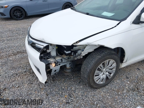 2012 Toyota Camry L z VIN 4T1BF1FK1CU532002, wystawiony jako IAAI lot #42215124 z przebiegiem 209 642 mil mil oraz . Historia ofert i sprzedaży dostępna na DreamBid. Obrazek 6.