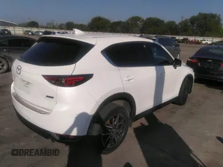 2018 Mazda CX-5 Grand Touring with VIN JM3KFADM4J0309540, listed as a IAAI auction lot 41868480 with 89,110 mi miles. Bid and sale history available at carsss.com. Image 4.