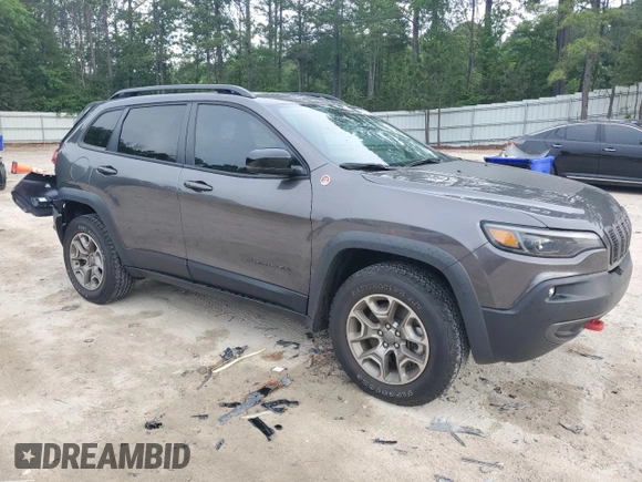 2022 Jeep Cherokee Trailhawk с VIN 1C4PJMBX1ND529146, выставлен на аукционе Copart как лот 56237365 с пробегом 26 718 миль миль и Списание • Salvage title. История ставок и продаж доступна на DreamBid. Изображение 4.