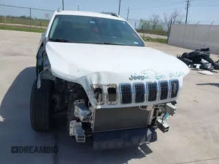 2019 Jeep Cherokee Latitude Plus with VIN 1C4PJLLB5KD301109, listed as a IAAI auction lot 41858478 with 52,647 mi miles and . Bid and sale history available at DreamBid. Image 6.