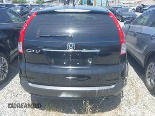 2014 Honda CR-V LX with VIN 2HKRM3H30EH551163, listed as a IAAI auction lot 42109975 with 57,712 mi miles. Bid and sale history available at carsss.com. Image 17.