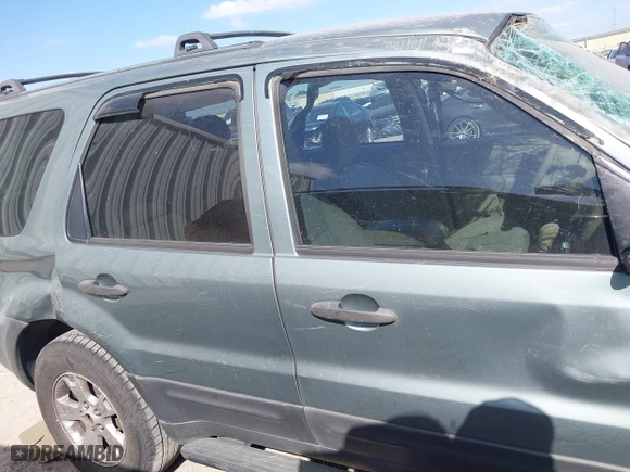2005 Ford Escape XLT with VIN 1FMYU03175KA84787, listed as a IAAI auction lot 41814099 with 168,342 mi miles. Bid and sale history available at carsss.com. Image 13.